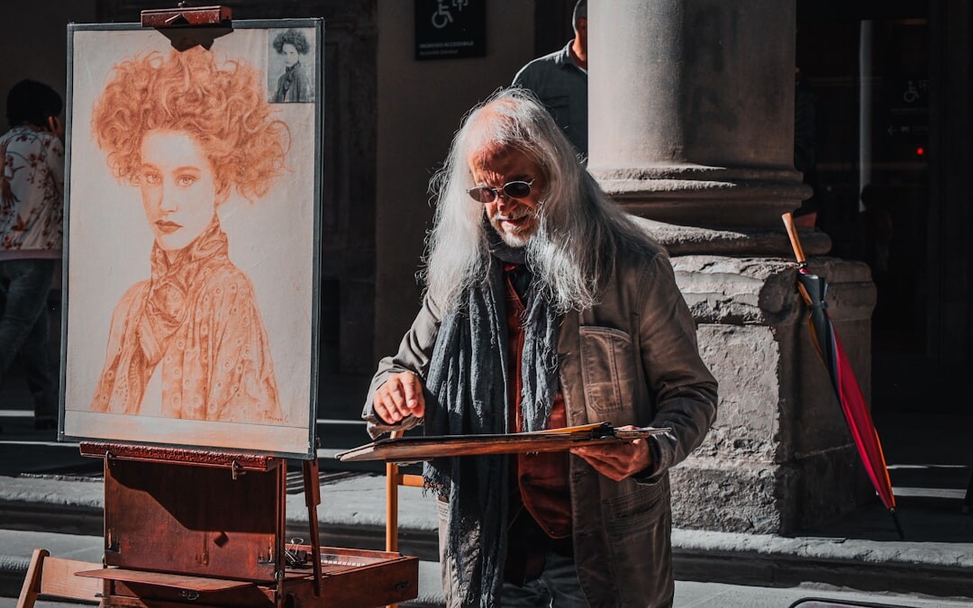 elderly artist painting