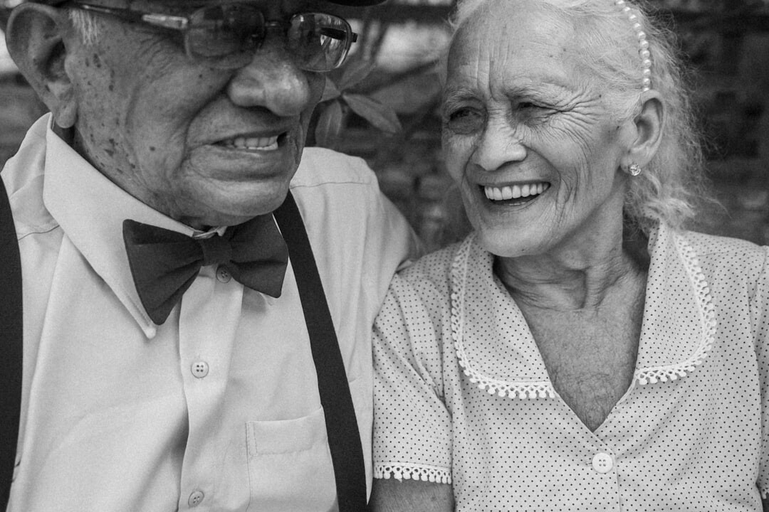 elderly group smiling together