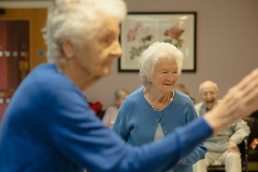 group of seniors doing yoga